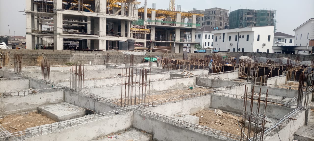Structural Engineering Blueprints and Construction Site Overview
